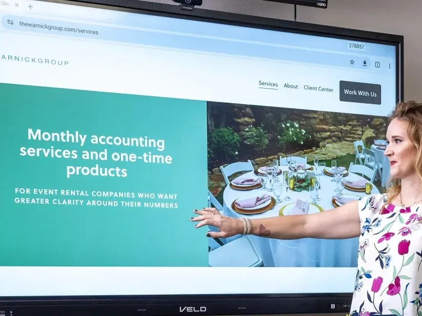 A presenter walking a meeting through a website on Veld Board